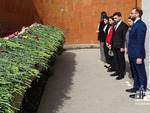 Laying flowers at the War Memorial in Stepanakert