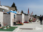 Laying flowers at the War Memorial in Stepanakert
