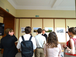 Amb. Gabrielyan explains the "Endangered Heritage of Artsakh" exhibition to SGH students